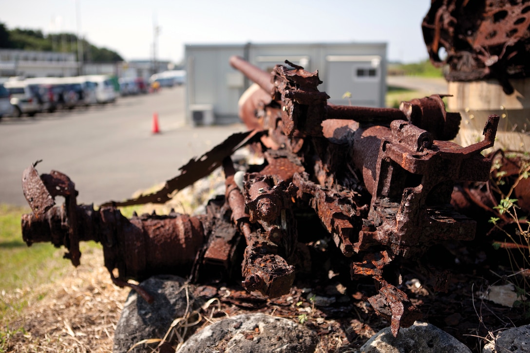 An old Japanese weapon lies rusted on the island of Iwo To, nearly 67 years after the Battle of Iwo Jima. Sixty-eight Marines and sailors with 3rd Marine Logistics Group visited the island for a professional military education tour. The service members had the opportunity to reflect on the lives lost during the battle and observe significant features on the island including caves, pill boxes and bunkers. 3rd MLG is a part of III Marine Expeditionary Force.