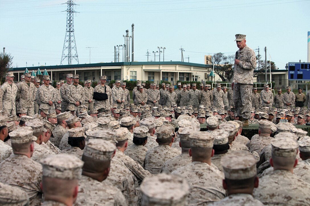 Lt. Gen. Kenneth J. Glueck Jr. addresses Marines, sailors and civilians Oct. 25 at Camp Courtney. The commanding general provided guidance to his command Jan. 4, explaining his expectations for 2013. The guidance reinforces the importance of each Marine and sailor understanding their commander's intent, and charged each service member with seizing the initiative and maintaining accountability for their actions in 2013. Glueck is the commanding general of III Marine Expeditionary Force.
