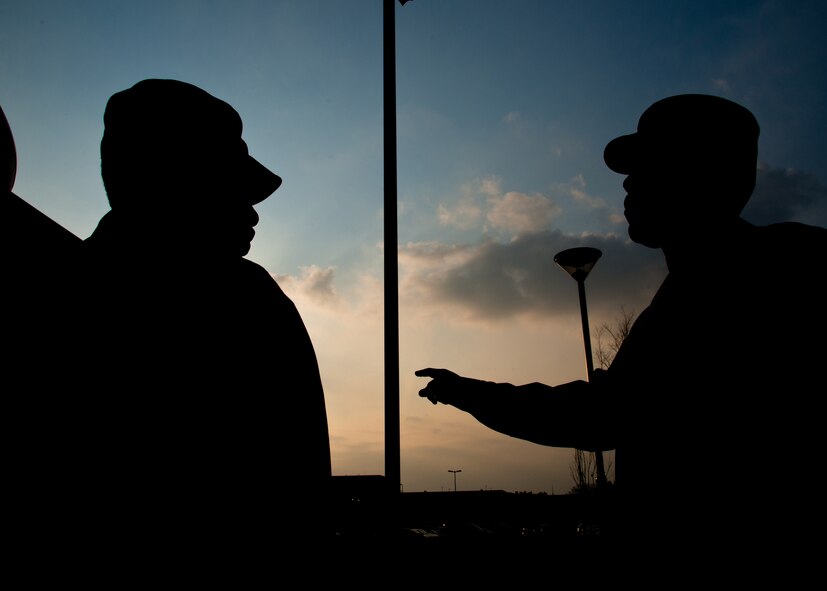 YOKOTA AIR BASE, Japan -- As the sun escapes behind the horizon, Tech. Sgt. Joseph Gambles, 374th Force Support Squadron Airman Leadership School instructor, remains on the drill pad at the Yokota Professional Development Center, refreshing his class on the basics of military formations. Gambles said he is in the best position of his career since he became a professional military education instructor. (U.S. Air Force photo by Senior Airman Cody H. Ramirez)