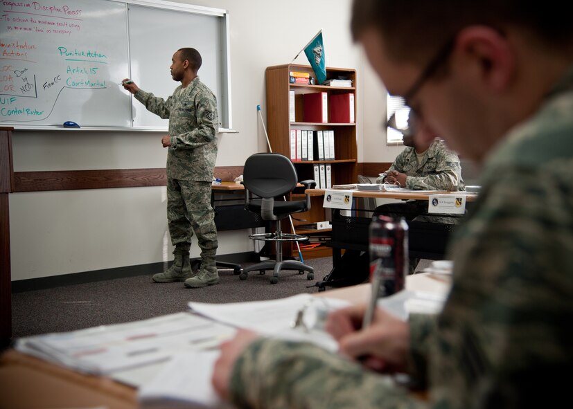 Tech. Sgt. Joseph Gambles, 374th Force Support Squadron Airman Leadership School instructor, educates a class of new, or soon-to-be, NCOs Jan. 9, 2013, at the Yokota Professional Development Center. The class instruction included the progressive discipline process along with administrative and punitive actions. This information is important for Airmen filling supervision roles. (U.S. Air Force photo/Senior Airman Cody H. Ramirez) 
