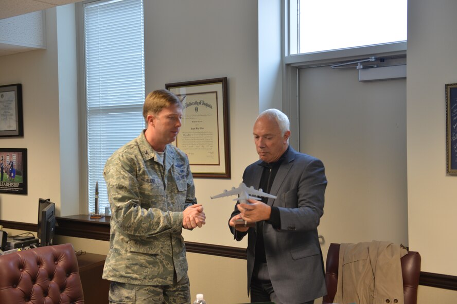 Col. Wyn Elder, 62nd Airlift Wing commander, and Mayor Bob Parker, mayor of Christchurch, New Zealand, admire a model of a C-17 Globemaster III, Jan. 9, 2013, at Joint Base Lewis-McChord, Wash. C-17 aircraft from the 62nd AW have been conducting missions to Christchurch since October 1999. (U.S. Air Force photo/Staff Sgt. Jason Truskowski)