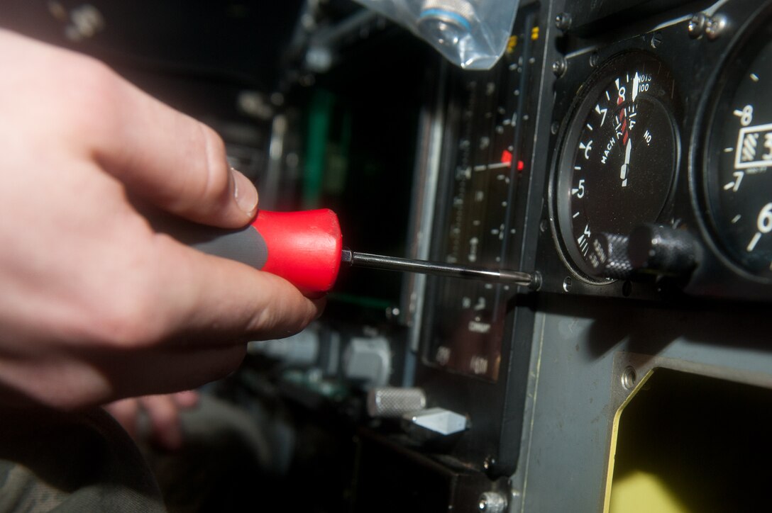 Airman 1st Class Jordan Carroll, 28th Aircraft Maintenance Squadron instrument flight controls system technician, inspects an airspeed indicator in the cockpit of a B-1 during scheduled maintenance on Ellsworth Air Force Base, S.D., Jan. 9, 2012. The indicator enables aircrews to track aircraft speeds and better control the flight of their aircraft. (U.S. Air Force photo by Airman 1st Class Kate Thornton-Maurer/Released)