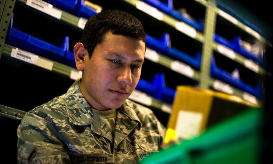 Airman Gerson Palacios-Espinoza, 22nd Logistic Readiness Squadron aircraft parts store journeyman, locates a requested part, Jan. 10, 2013, McConnell Air Force Base, Kan. Palacios-Espinoza supports McConnell’s mission by maintaining the flow of supplies to Airmen who keep the KC-135 Stratotanker flying. (U.S. Air Force photo/Senior Airman Armando A. Schwier-Morales)