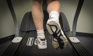 An Airman walks on a treadmill during an appointment at the Gait Analysis Clinic, Jan. 8, 2013 at Joint Base Charleston – Air Base, S.C. During a session with the Gait Analysis Clinic, a physical therapist will observe a patient walk on a treadmill with running shoes and bare-foot. (U.S. Air Force photo/Staff Sgt. Anthony Hyatt)
