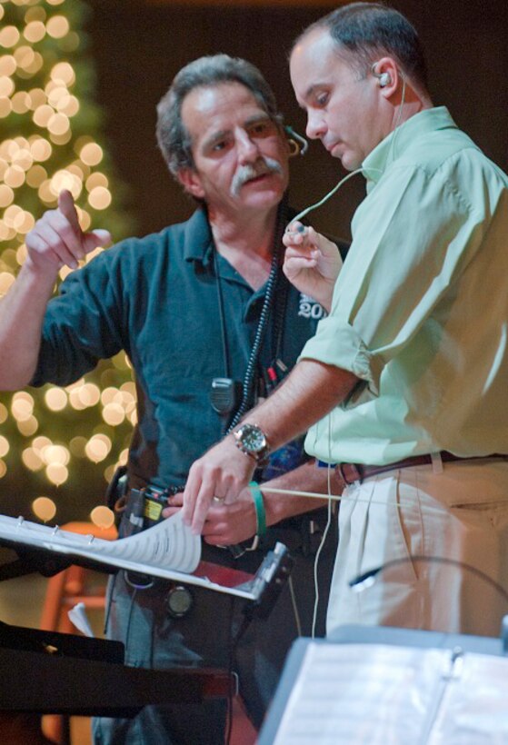 Air Force Academy Band leader Lt. Col. Don Schofield, right, speaks with producer Bill Turner at a rehearsal for the Emmy-nominated production, “Holiday Notes from Home” in October 2011. (Photo courtesy of Lt. Col. Don Schofield)