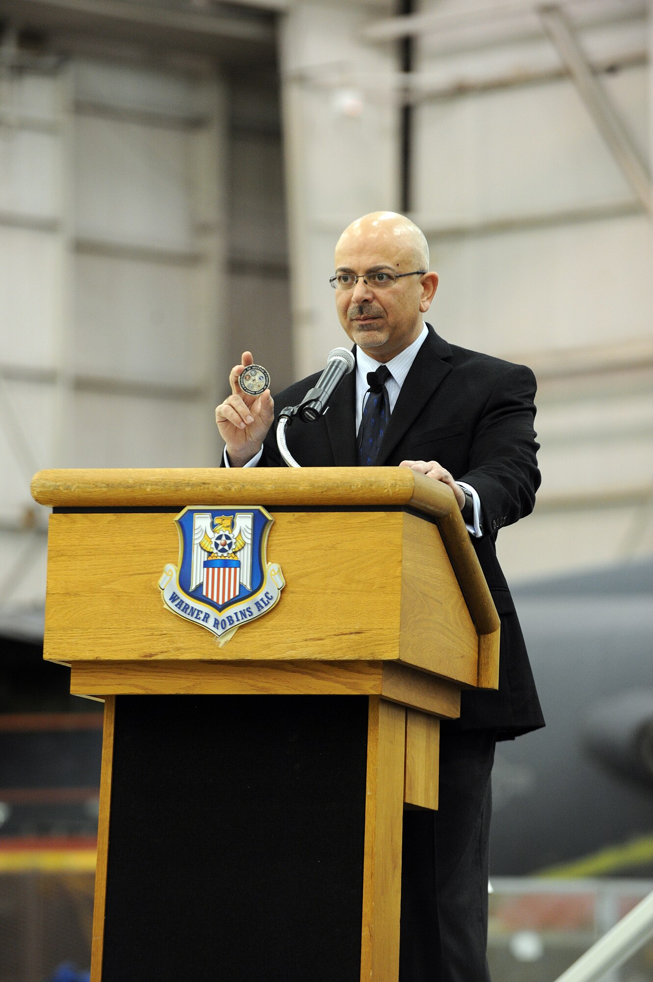 John Johns, Deputy Assistant Secretary of Defense for Maintenance Policy & Programs, Pentagon, speaks to members of the Warner Robins Air Logistic Complex's 
C-130 Programmed Depot Maintenance team.  Johns presented the team with the Robert T. Mason Excellence Award Jan. 10 at Robins Air Force Base. (U.S. Air Force photo by Tommie Horton)