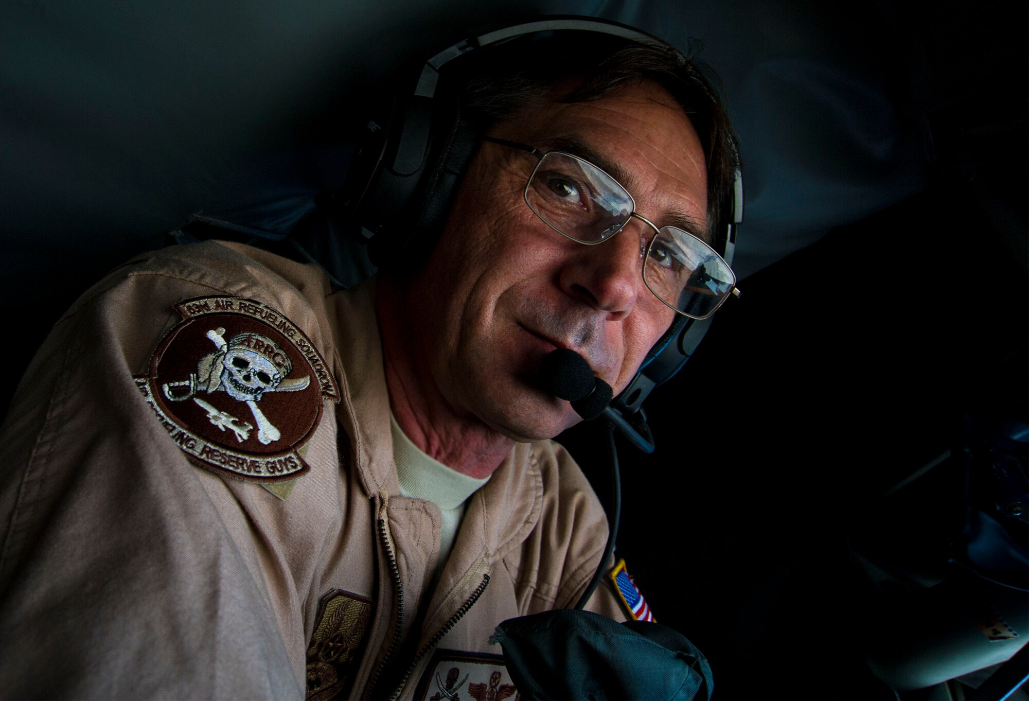 Chief Master Sgt. Robert Renn, KC-135 Stratotanker boom operator, performs an air refueling over Afghanistan, Dec. 22. During this flight the 340th EARS reached 50,000 flying hours for the year 2012. During the mission, the aircrew refueled a B-1B Lancer and an F-16 Fighting Falcon over Afghanistan, in support of Operation Enduring Freedom. Renn is deployed from MacDill Air Force Base, Fla. and is a native of Tampa, Fla. (US Air Force photo/Staff Sgt. Ashley Reed)

