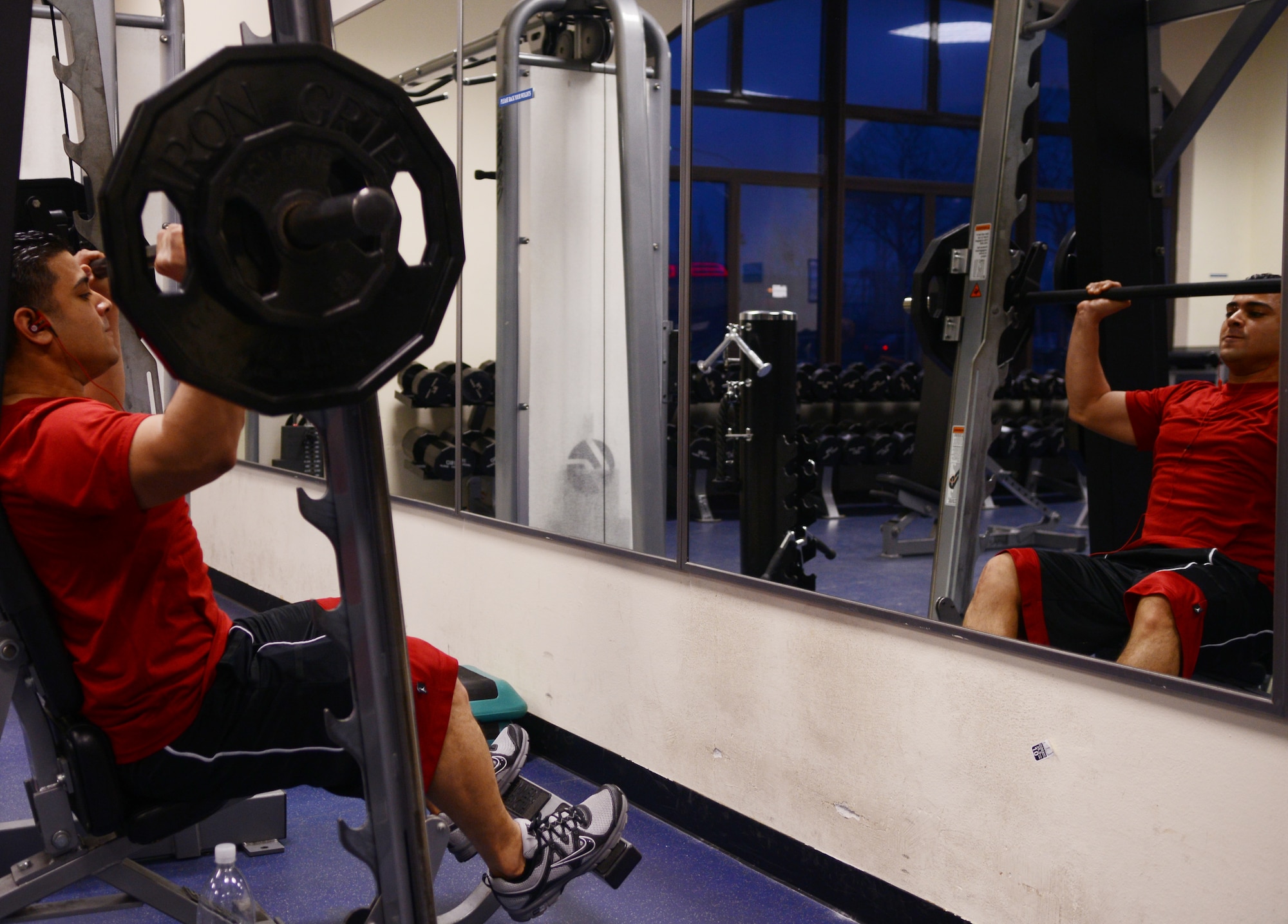 Tech. Sgt. Lebron Edgardo, 31st Operations Support Squadron air field manager, lifts weights Jan. 10 at Aviano Air Base, Italy. Weight training, cardio, spin class and all other fitness classes count toward this year’s Biggest Winner competition. (U.S. Air Force photo/Airman 1st Class Briana Jones)