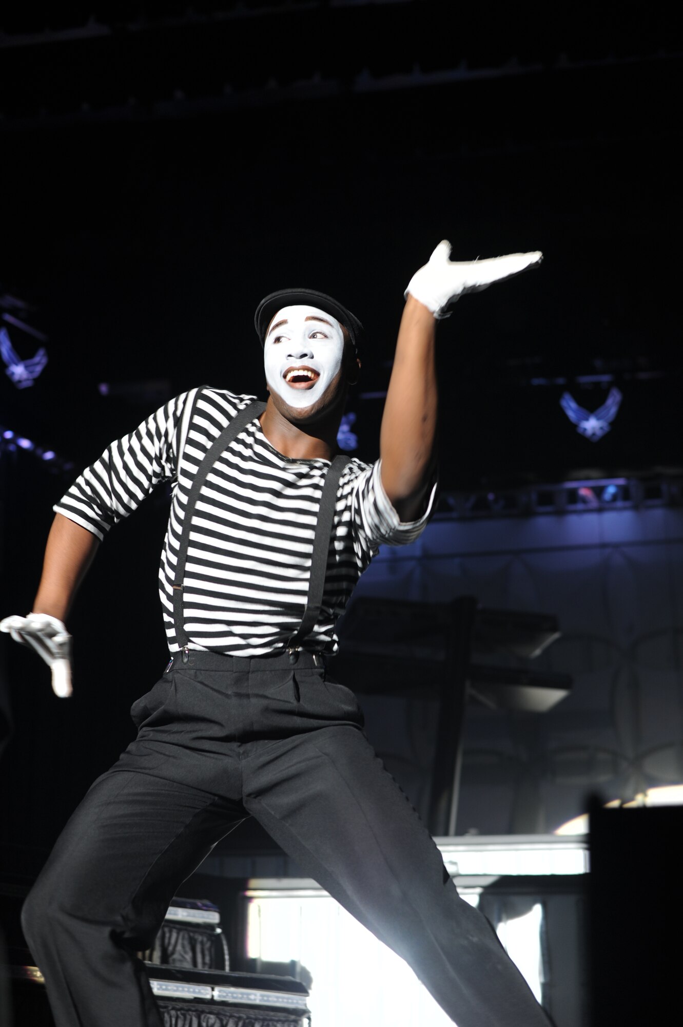 JOINT BASE ANDREWS, Md - Airman 1st Class Jonathan Leak, 324th Intelligence Squadron knowledge operations management apprentice, pantomimes to a song titled “Grenade,” Jan. 5, 2013 during a Tops in Blue performance. This year the tour entitled “Listen,” included 130 performances in 10 ten months. (U.S. Air Force photo/Airman 1st Class Aaron Stout)