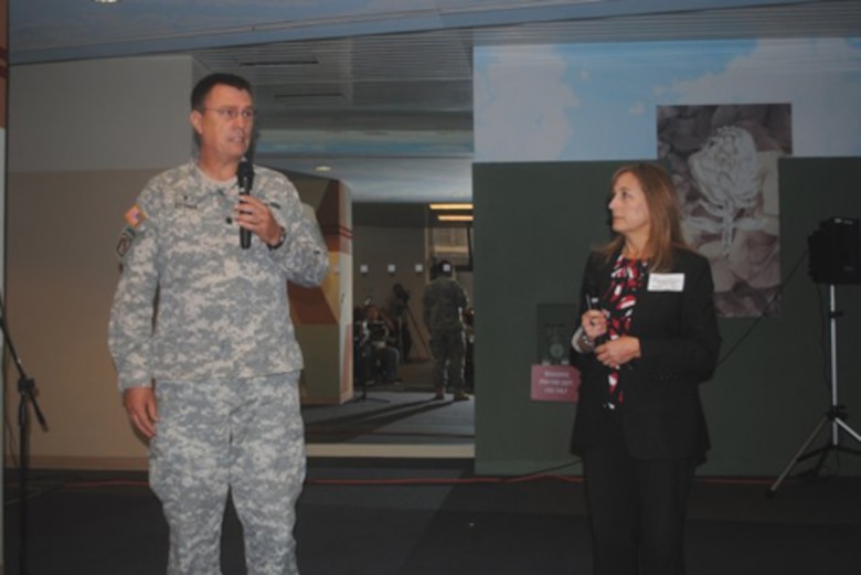 Lt. Col. Dann Ettner, deputy command chaplain of the 63rd Regional Support Command, and Jeanette Longtin, director of Psychological Health at the 63rd RSC, discuss suicide prevention Oct. 11 with employees from the Corps' South Pacific Division and San Francisco District.  

