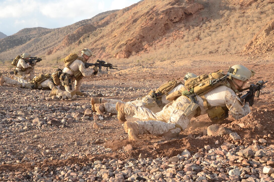 U.S. Marines with the 15th Marine Expeditionary Unit, perform rifle qualification drills at Arta Beach, Djibouti, Dec. 18, 2012. The 15th MEU is deployed as part of the Peleliu Amphibious Ready Group as a U.S. Central Command theater reserve force, providing support for maritime security operations and theater security cooperation efforts in the U.S. 5th Fleet area of responsibility. (U.S. Marine Corps photo by Cpl. Richard P. Sanglap-Heramis/Not Released)