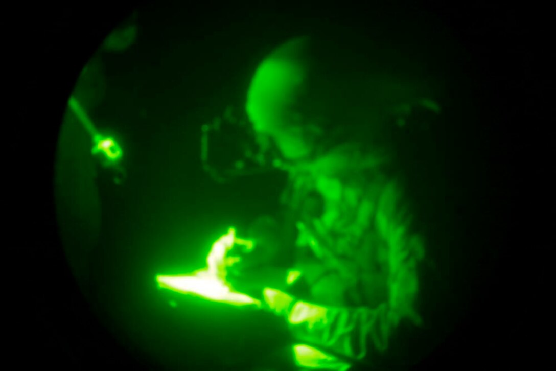 A Marine with 1st Platoon, Kilo Company, Battalion Landing Team 3/5, 15th Marine Expeditionary Unit, draws a diagram of the building his unit just cleared during the tactical site exploitation part of a raid in Djibouti, Africa, Dec. 16. The 15th MEU is deployed as part of the Peleliu Amphibious Ready Group as a U.S. Central Command theater reserve force, providing support for maritime security operations and theater security cooperation efforts in the U.S. 5th Fleet area of responsibility. (U.S. Marine Corps photo by Cpl. John Robbart III)