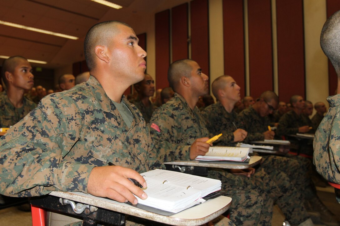 Recruits of Company A, 1st Recruit Training Battalion, listen attentively during a class on fraternization in recruit training aboard Marine Corps Recruit Depot San Diego Jan. 4.