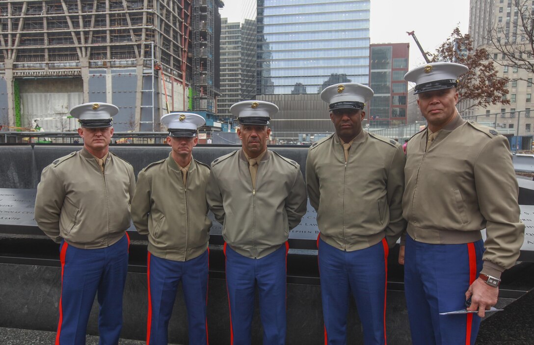 Sergeants Major of recruiting stations falling under 1st Marine Corps District, pose for a photo at the 9/11 memorial in New York City, Jan. 9. Commanding officers, sergeants major and recruiter instructors within 1st Marine Corps District, travelled to New York City and visited the 9/11 memorial and received  a tour of the Intrepid museum. (Official U.S. Marine Corps photo by Sgt. Caleb Gomez)