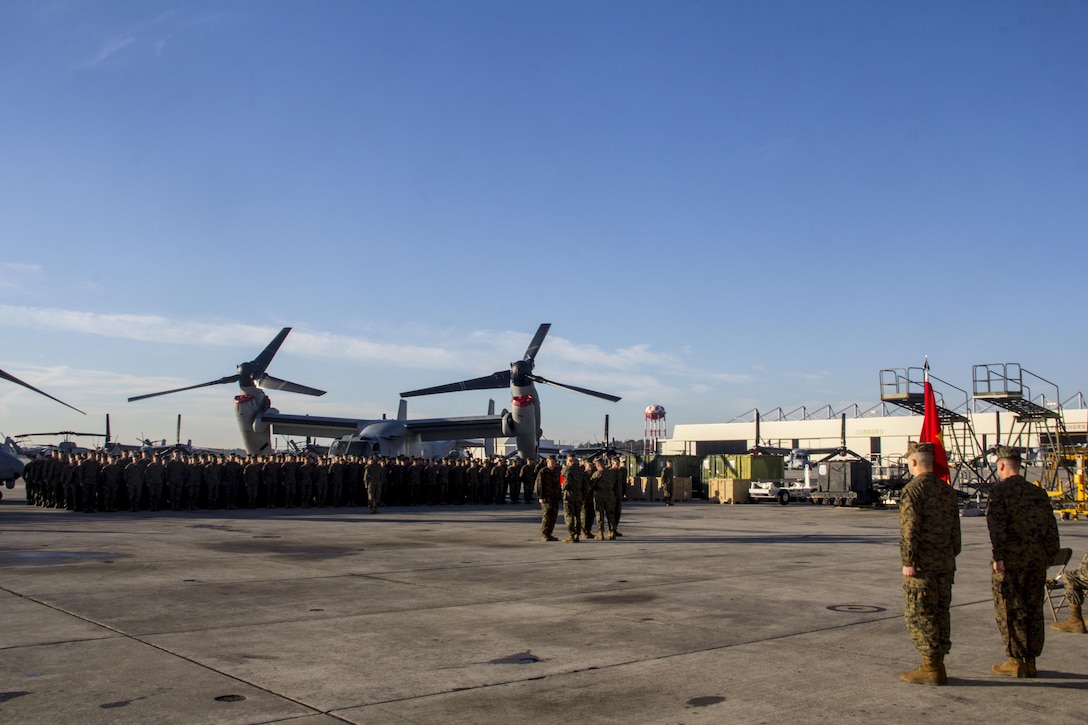 The pilot and flight crew of an MV-22B Osprey with Marine Medium Tiltrotor Squadron (VMM) 266 Reinforced who were involved in the rescue of a downed Air Force pilot during Operation Odyssey Dawn recieve Air Medals at Marine Corps Air Station New River, N.C., Jan. 7, 2013. VMM-266 (Rein) is currently reinforcing the 26th Marine Expeditionary Unit, slated to deploy in early 2013.