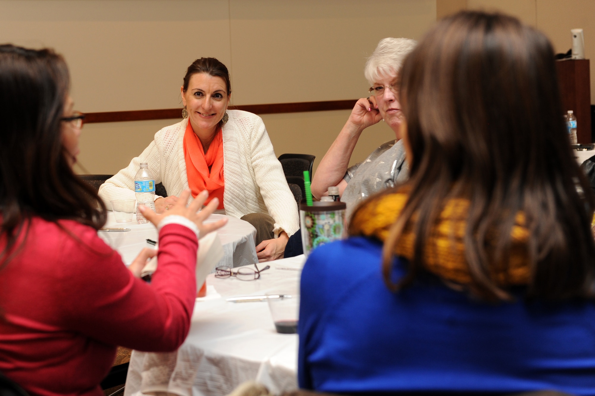 Christina Stump, 460th Space Wing community support coordinator, second from left, discusses topics during the Ladies Empowerment Social and Book club Jan. 10, 2013, at the Buckley Air Force Base’s Leadership Development Center. The social event provided Team Buckley’s women the opportunity to come together and share their opinions about a book called “The Gift of Fear” by Gavin de Becker. (U.S. Air Force photo by Senior Airman Marcy Glass/Released)