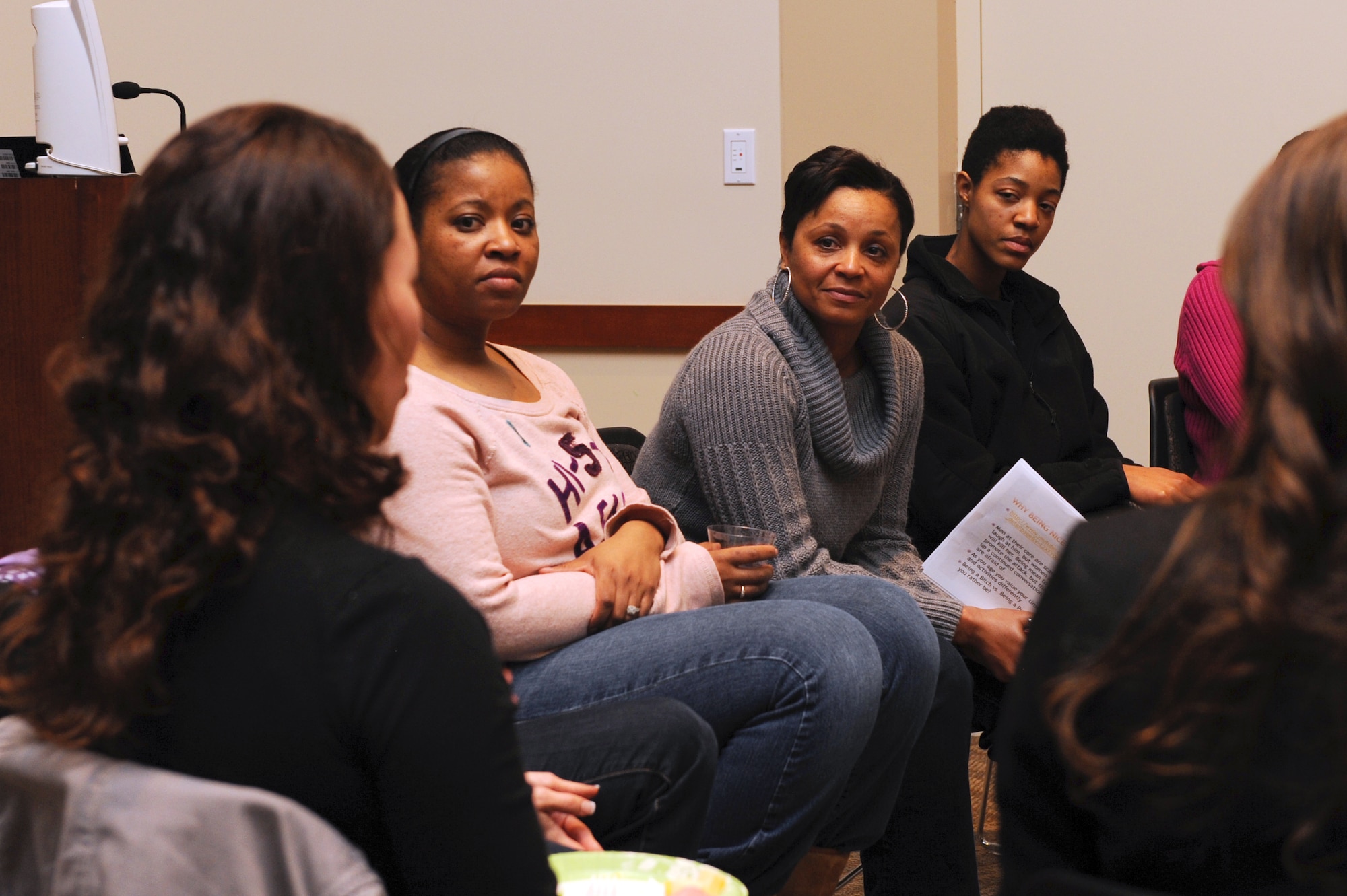 Chief Master Sgt. Marilyn Savage, 460th Mission Support Group chief enlisted advisor, third from left,  participates in a group discussion Jan. 10, 2013, at the Buckley Air Force Base Leadership Development Center during the Ladies Empowerment Social and Book Club. Attendees discussed topics about sexual assault and sexual assault prevention. (U.S. Air Force photo by Senior Airman Marcy Glass/Released)