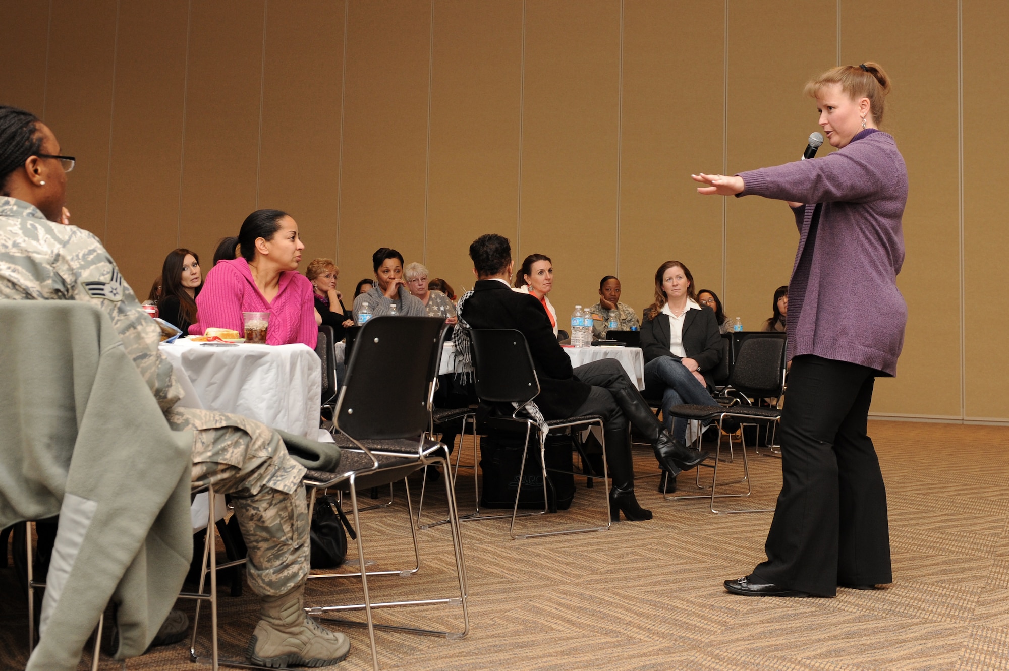 Col. DeAnna Burt, 460th Operations Group commander, opens the Ladies Empowerment Social and Book Club with a brief on sexual assault and sexual assault prevention Jan. 10, 2013, at the Buckley Air Force Base Leadership Development Center. Senior female leadership offered insight and direction at the social, the first of it's kind at Buckley.Team Buckley women come together to discuss and empower one another. (U.S. Air Force photo by Senior Airman Marcy Glass/Released)
