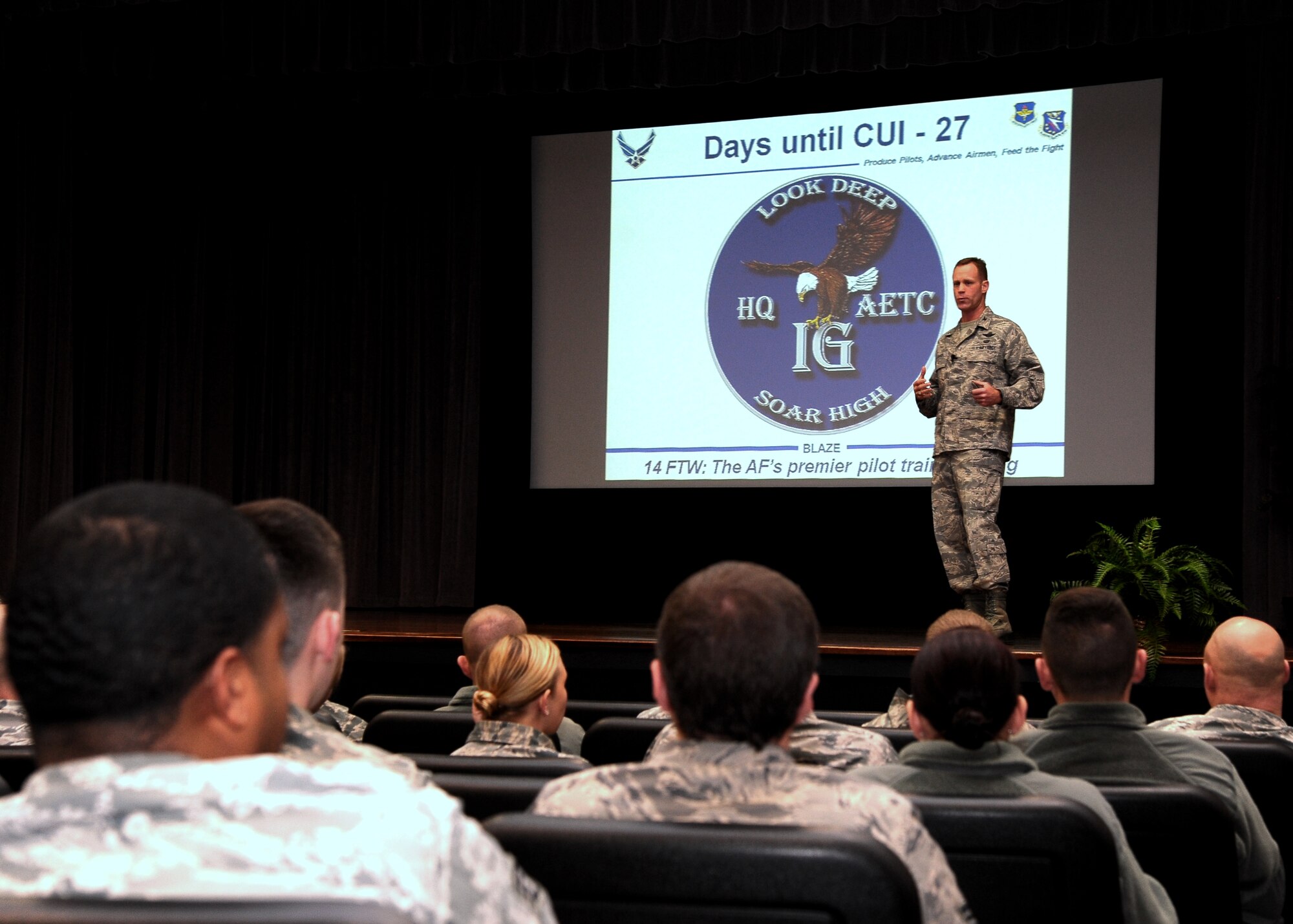 Col. Jim Sears, 14th Flying Training Wing Commander welcomes back Airmen of Columbus Air Force Base after the holidays during a Commander’s Call in Kaye Auditorium.  Sears spoke on CUI preparation, reverting focus back to the mission and many other topics during the calls.  (U.S. Air Force Photo/Airman 1st Class Charles Dickens)