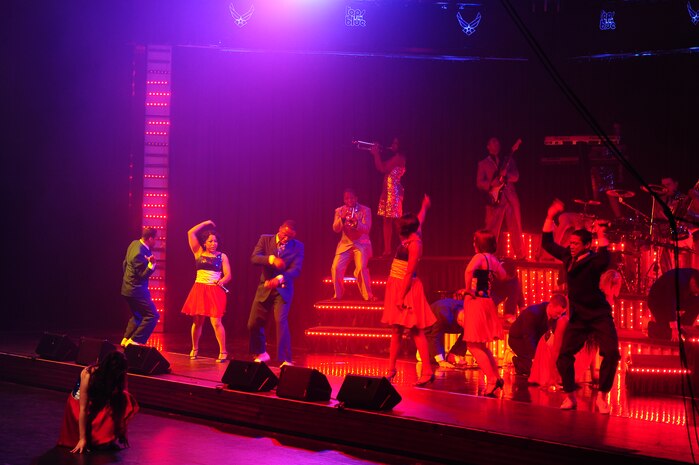 Members of the Tops in Blue perform Jan. 9, 2013, at the North Charleston Performing Arts Center, S.C. Tops in Blue is an expeditionary entertainment unit that provides quality entertainment for the service members and their families stationed worldwide and at remote and deployed locations, while simultaneously promoting community relations, supporting recruiting efforts and serving as ambassadors for the United States of America and the U.S. Air Force.  (U.S. Air Force photo/ Airman 1st Class Chacarra Walker)