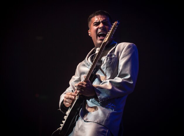 Senior Airman Kenneth Del Valle Ruiz performs at the Tops in Blue show Jan. 9, 2013, at the North Charleston Performing Arts Center, S.C. Composed of 35 to 40 vocalists, musicians, dancers and technicians, their primary mission is to perform for military personnel and their families around the world. This year's tour took Tops in Blue throughout the United States and to more than 20 countries with approximately 130 performances during a 10-month period. (U.S. Air Force photo/Airman 1st Class Ashlee Galloway)