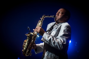 Airman 1st Class Wynton Warren plays the alto saxophone during the Tops in Blue show Jan. 9, 2013, at the North Charleston Performing Arts Center, S.C. Composed of 35 to 40 vocalists, musicians, dancers and technicians, their primary mission is to perform for military personnel and their families around the world. This year's tour took Tops in Blue throughout the United States and to more than 20 countries with approximately 130 performances during a 10-month period. (U.S. Air Force photo/Airman 1st Class Ashlee Galloway)