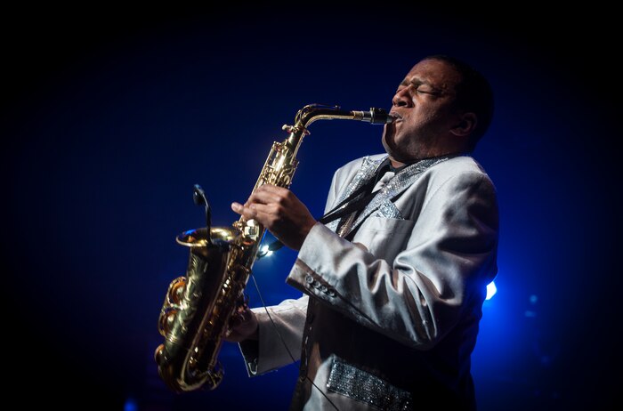 Airman 1st Class Wynton Warren plays the alto saxophone during the Tops in Blue show Jan. 9, 2013, at the North Charleston Performing Arts Center, S.C. Composed of 35 to 40 vocalists, musicians, dancers and technicians, their primary mission is to perform for military personnel and their families around the world. This year's tour took Tops in Blue throughout the United States and to more than 20 countries with approximately 130 performances during a 10-month period. (U.S. Air Force photo/Airman 1st Class Ashlee Galloway)