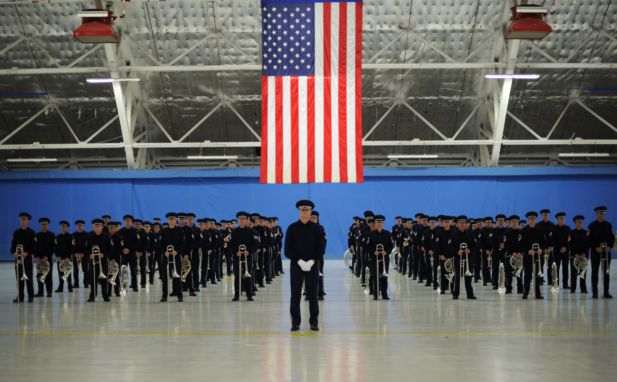 The U.S. Air Force Band stands at parade rest during preparation for the 57th Presidential Inaugural Parade. The USAF Band and Honor Guard held rehearsal at Joint Base Andrews, Md., Jan. 11, 2013.  (U.S. Air Force photo/Airman 1st Class Nesha Humes)(Released)