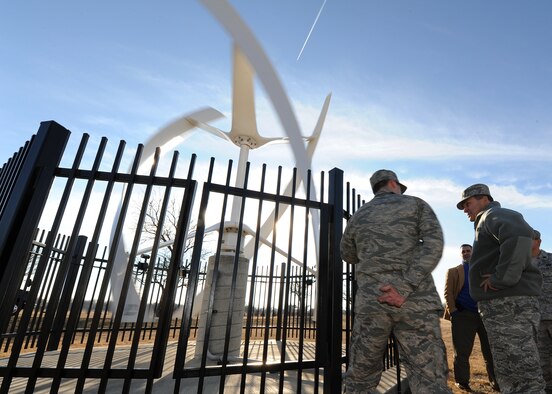 Senior Airman Cody Bryce, 22nd Civil Engineer Squadron electrical power production technician, showcases McConnell’s wind generator to Maj. Gen. Timothy Byers, the U.S. Air Force Civil Engineer, Jan. 8, 2013, McConnell Air Force Base, Kan. The generator supplies supplementary power to the base’s water analysis room. As team lead for the 2013 Commander in Chief’s Installation Excellence Award assessment team, Byers visited several groups and squadrons as part of the two-day assessment of McConnell and how the base’s resources are used. (U.S. Air Force photo/Senior Airman Katrina M. Brisbin) 