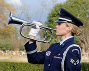 Senior Airman Amber Wingate, 2nd Medical Operations Squadron, plays "Taps" during the memorial service of Senior MSgt. Thomas Steward at Hill Crest Memorial Funeral Home, Bossier City, La., Jan. 10. The bugle call dates back to the late 1800s and signals that the duty day is done, but more importantly brings closure of the deceased's military career. (U.S. Air Force photo/Airman 1st Class Andrew Moua)