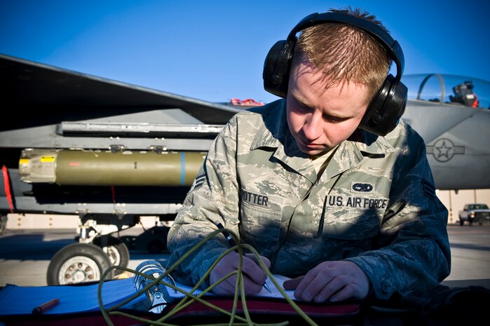 Senior Airman Jesse Potter, 57th Aircraft Maintenance Squadron aircraft armament systems technician, evaluates his checklist during the load crew competition of the year, Jan. 11, 2013, at Nellis Air Force Base, Nev. Load crew members are selected by their section chiefs based on overall job performance. (U.S. Air Force photo by Airman 1st Class Christopher Tam)
