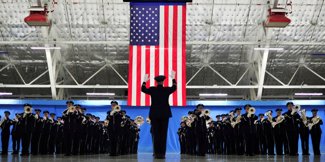 Col. Larry Lang, U.S. Air Force Band commander and conductor, leads the band in a musical selection during rehearsal for the 57th Presidential Inaugural Parade on Joint Base Andrews, Md., Jan. 11, 2013. Approximately 15,000 military personnel from 133 units will be participating in the parade January 21, 2013. (U.S. Air Force photo/ Airman 1st Class Erin O’Shea)