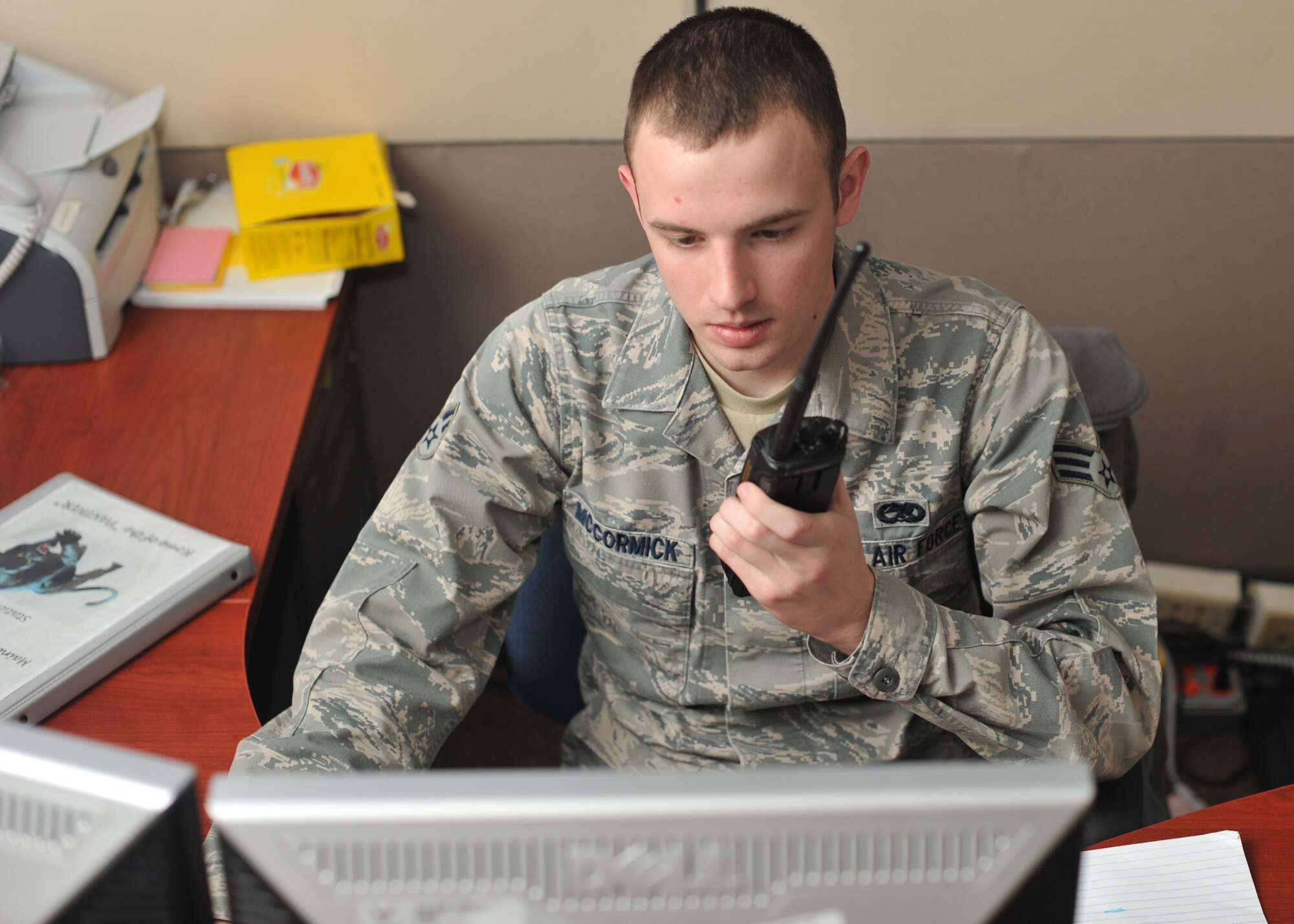 Senior Airman Tucker McCormick, 22nd Maintenance Operations Controller Squadron, communicates to maintainers on the flightline Jan. 4, 2013, McConnell Air Force Base, Kan. McCormick was selected as the spotlight performer for the week of Jan. 7 to 11, 2013, for his dedication to the 22nd Air Refueling Wing commander’s intents. (U.S. Air Force photo/Airman 1st Class Maurice A. Hodges)