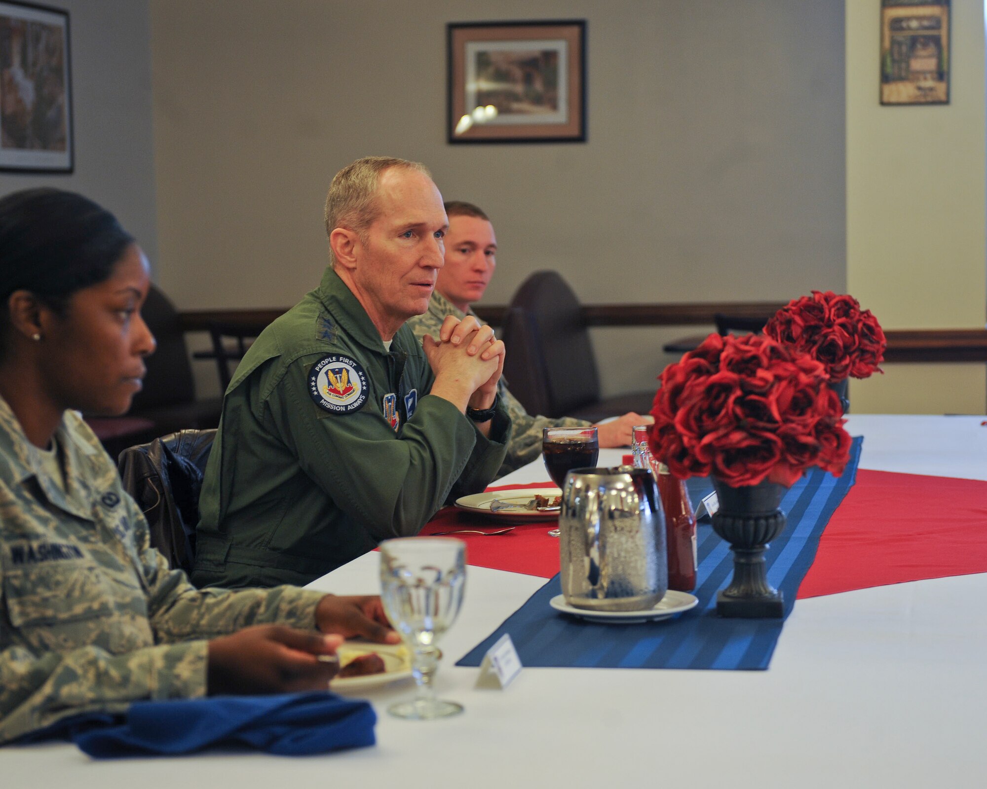 U.S. Air Force Gen. Mike Hostage, commander of Air Combat Command, speaks with Airmen during lunch at the Georgia Pines Dining Facility at Moody Air Force Base, Ga., Jan. 8, 2012. Hostage answered a variety of questions and gave advice on leadership and educational opportunities. (U.S. Air Force photo by Airman 1st Class Olivia Bumpers/Released) 