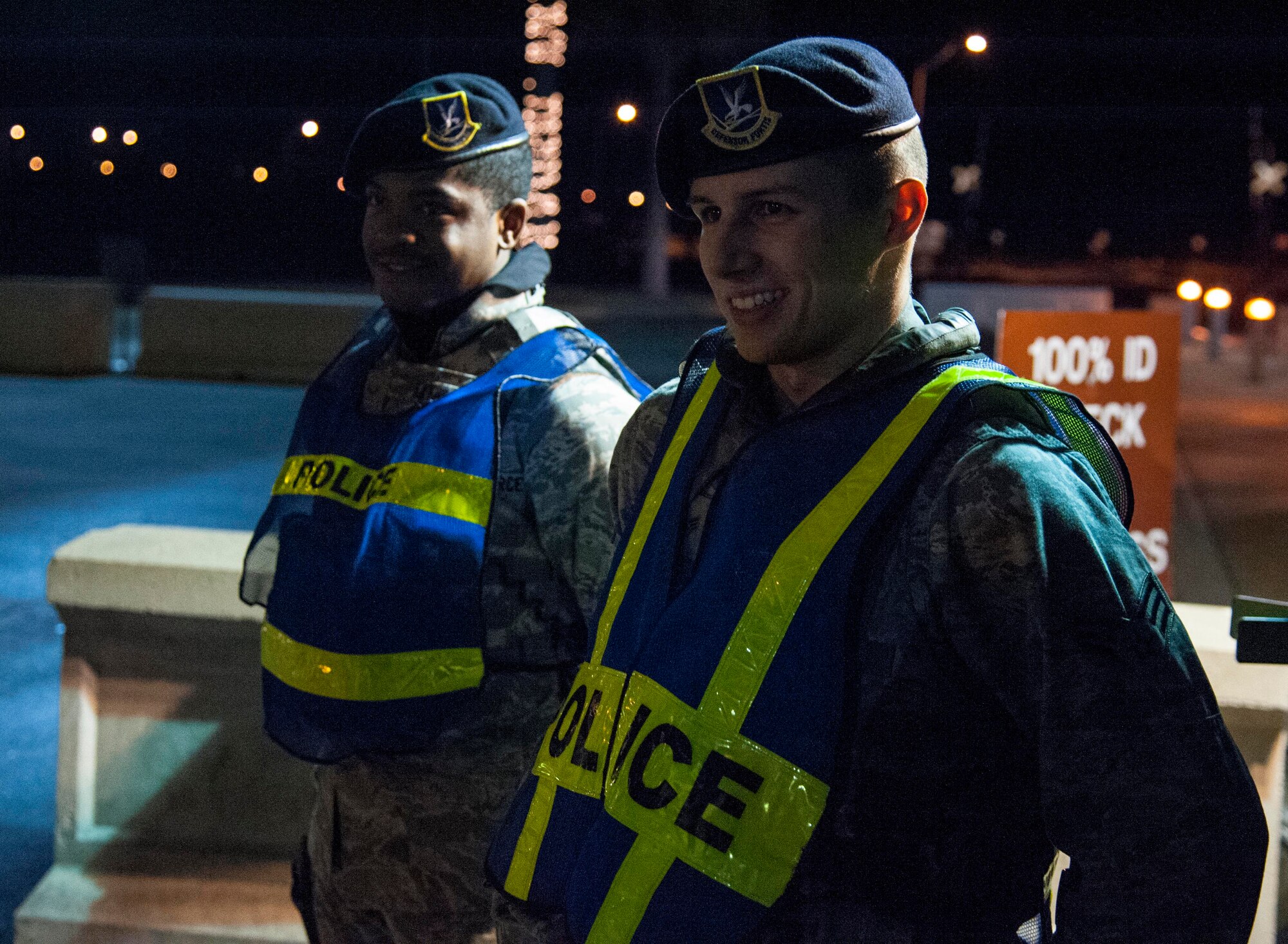 Senior Airman Alexander Hedgecock and Airman 1st Class James Little, 47th Security Forces Squadron patrolmen, stand ready at the main gate of Laughlin Air Force Base, Texas, Jan. 7, 2013. No matter what weather conditions are prevailing or what holiday it may be, there will always be a gate guard standing ready year round. (U.S. Air Force photo/Airman 1st Class Nathan Maysonet)
