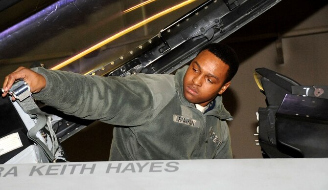 U.S. Air Force Airman Basic Jeremy Franklin, 13th Aircraft Maintenance Unit crew member, prepares an F-16 Fighting Falcon for inspection during the Initial Response Readiness Exercise at Misawa Air Base, Japan, Jan. 11, 2013. During an IRRE, maintainers are tasked with preparing jets for a simulated war scenario. (U.S. Air Force photo/Airman 1st Class Kenna Jackson) 
