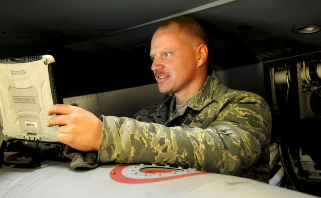 U.S. Air Force Tech. Sgt. Kurt Haydam, 35th Aircraft Maintenance Squadron electrical and environmental technician, refers to his technical orders while doing maintenance on an F-16 Fighting Falcon during an Initial Response Readiness Exercise at Misawa Air Base, Japan, Jan. 10, 2013. Everything a maintainer needs to know when maintaining an aircraft can be found on the screen of the TO. The purpose of the IRRE is to test the wing’s ability to generate aircraft and deploy combat power to a given area of responsibility. (U.S. Air Force photo/Airman 1st Class Kenna Jackson) 
