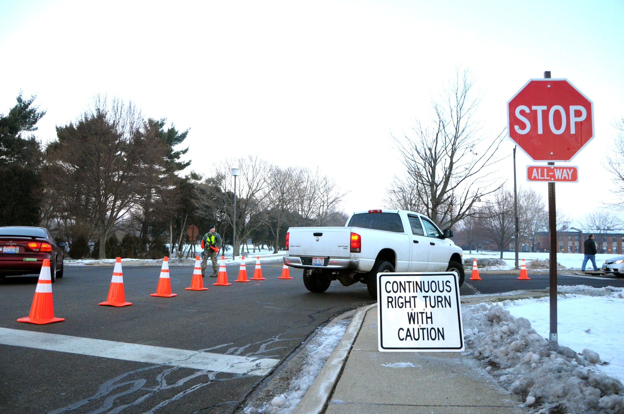 The 88th Security Forces Squadron and the 88th Civil Engineer Directorate have worked together to combat congestion during peak times at the intersection of Chidlaw Road and Spruce Way, Area A, via implementation of a continuous right-hand turn onto Spruce. CE continues to evaluate traffic flow there.  (photo by Niki Jahns) 