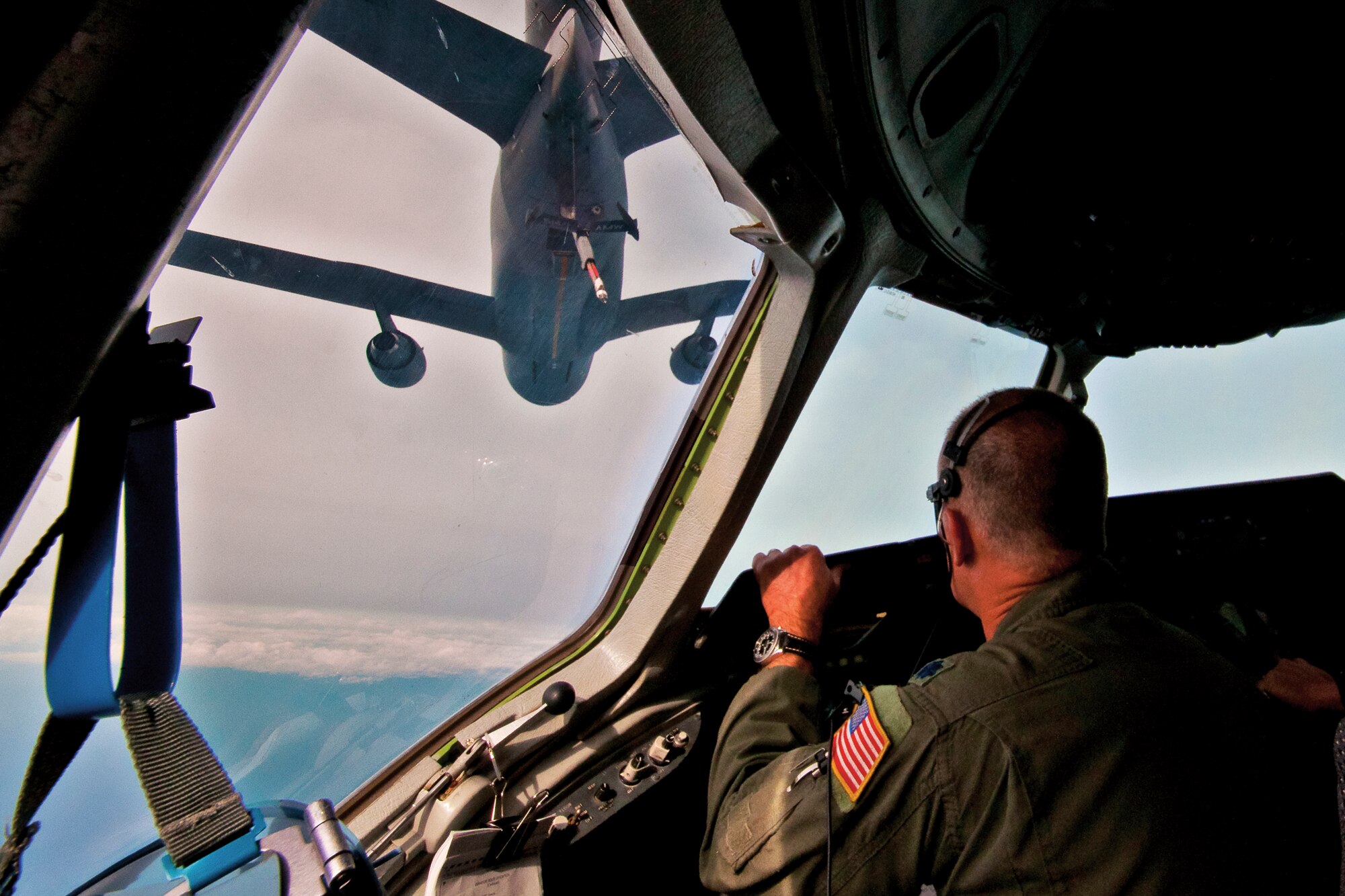 Lt. Col. Rod Biggs, 78th Air Refueling Squadron, pilots one KC-10 Extender behind another as part of refueling practice Dec. 1. Biggs received the 2012 Pilots for Kids Award for his years of dedication in helping hospitalized children. He has been serving with the Pilots for Kids organization since 1999. (U.S. Air Force photo by Shawn J. Jones)
