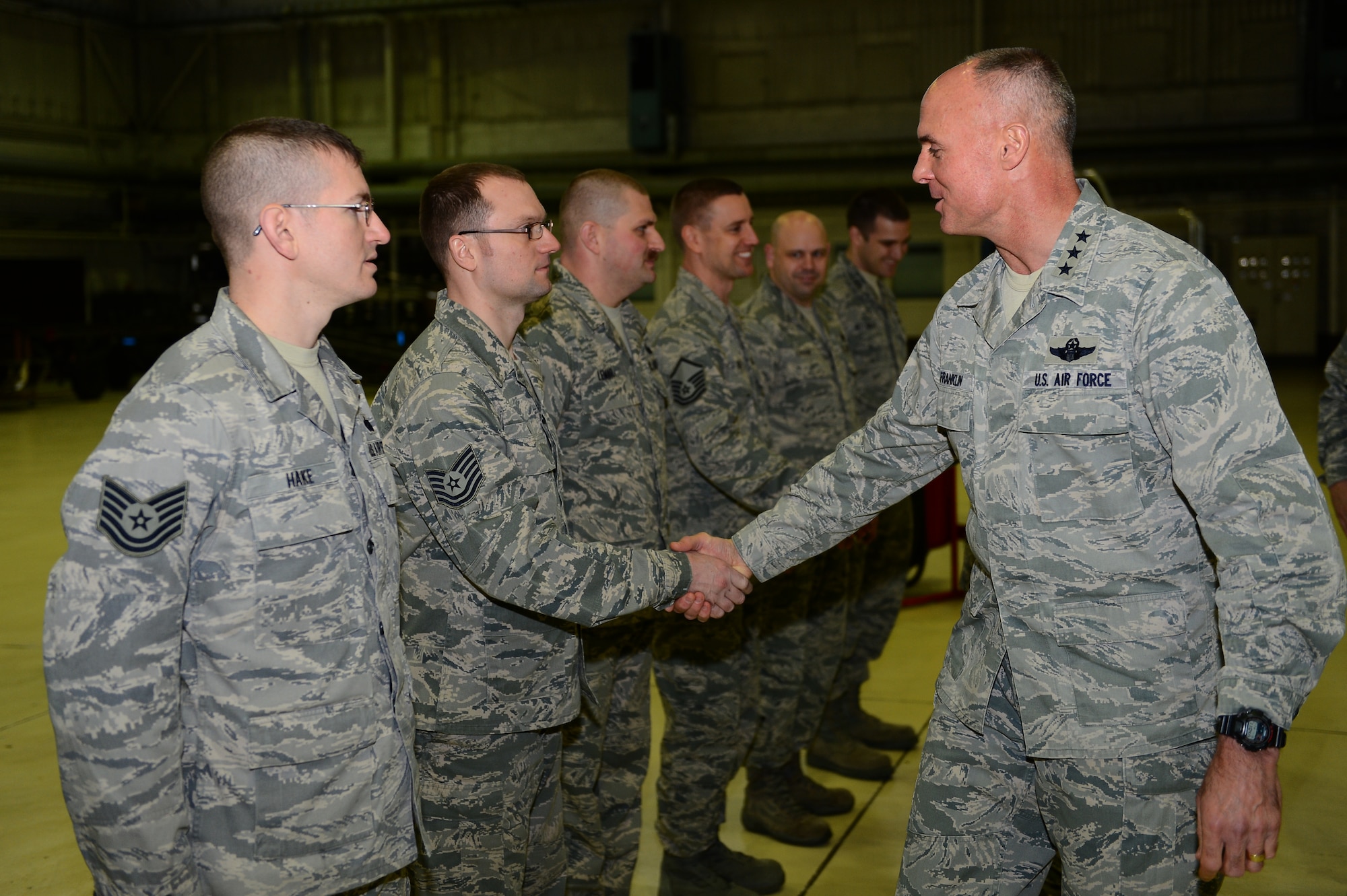 SPANGDAHLEM AIR BASE, Germany – U.S. Air Force Lt. Gen. Craig A. Franklin, 3rd Air Force commander, greets Airmen from the 52nd Equipment Maintenance Squadron during a visit inside Hangar 2, Jan. 10, 2013. Franklin visited the base to meet with Airmen and to address local operational challenges. (U.S. Air Force photo by Airman 1st Class Dillon Davis/Released)