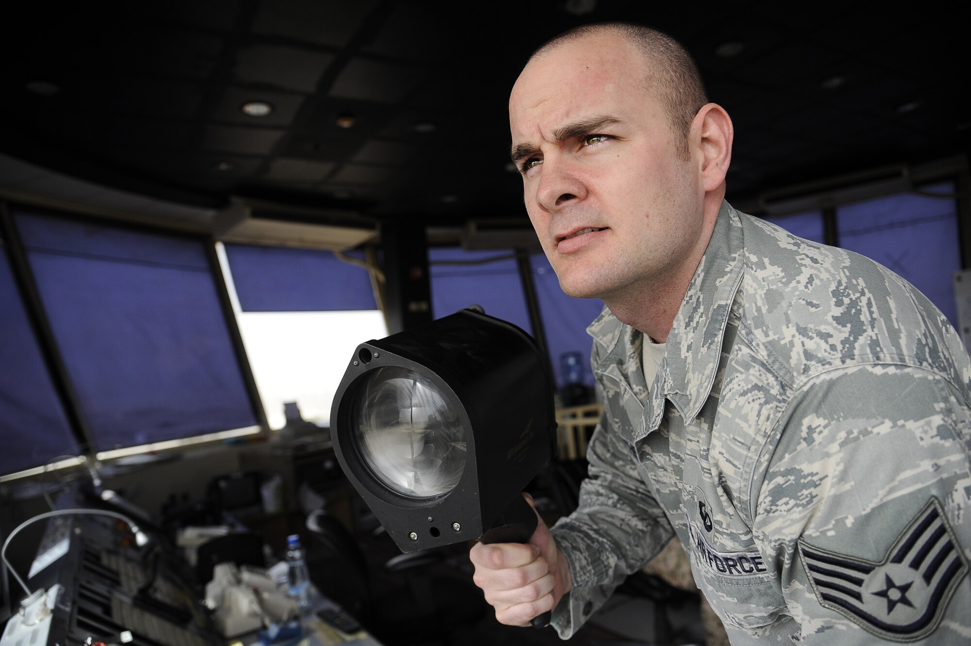 Staff Sgt. Garie Routhieaux, 386th Expeditionary Operations Support Squadron, performs his duty as an air traffic tower liason at an undisclosed deployed location in Southwest Asia on Jan. 11, 2013.  Routhieaux was awarded this weeks “Rock Solid Warrior” designation by the 386 Air Expeditionary Wing.  (U.S. Air Force photo by Staff Sgt. Austin Knox)
