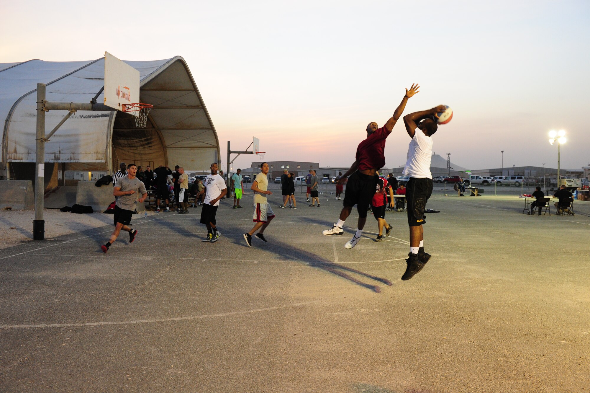 SOUTHWEST ASIA – More than 125 personnel participated in the Rising Six’s 3-on-3 street basketball tournament Jan. 5 designed to encourage camaraderie amongst the deployed service members. The Rising Six is a service-base organization open to all enlisted service members from E-1 to E-6. (U.S. Air Force photo/Master Sgt. Brendan Kavanaugh)