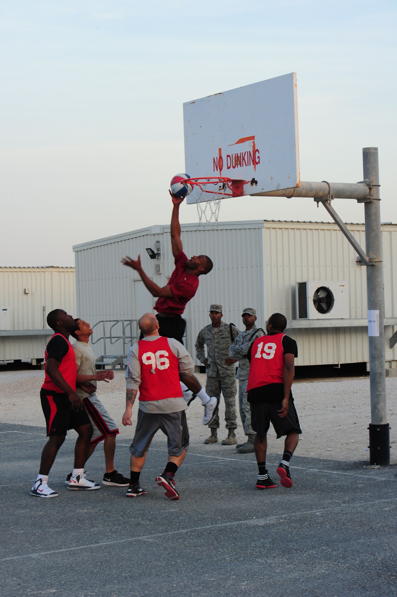 SOUTHWEST ASIA – More than 125 personnel participated in the Rising Six’s 3-on-3 street basketball tournament Jan. 5 designed to encourage camaraderie amongst the deployed service members. The Rising Six is a service-base organization open to all enlisted service members from E-1 to E-6. (U.S. Air Force photo/Master Sgt. Brendan Kavanaugh)