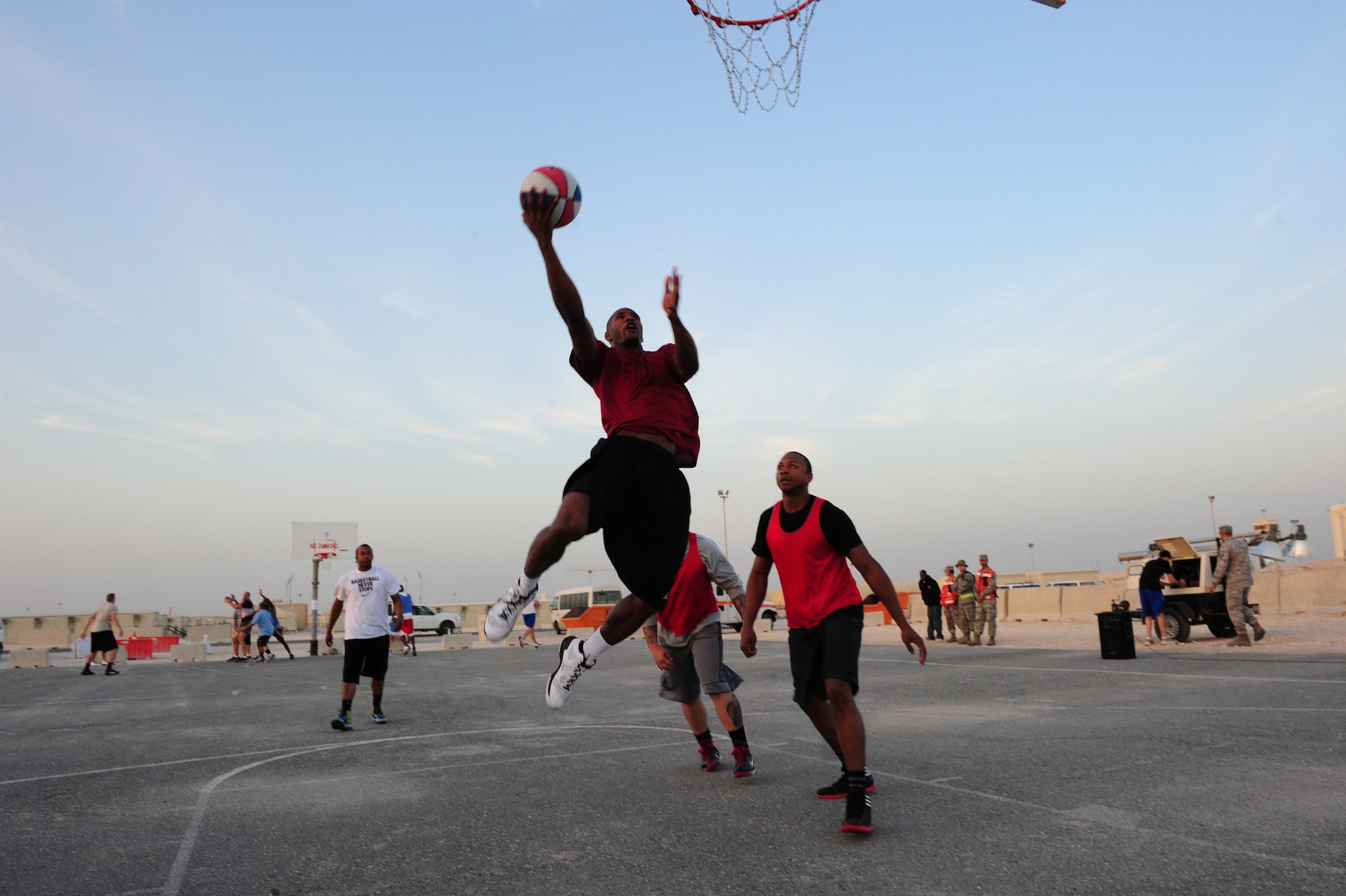 SOUTHWEST ASIA – More than 125 personnel participated in the Rising Six’s 3-on-3 street basketball tournament Jan. 5 designed to encourage camaraderie amongst the deployed service members. The Rising Six is a service-base organization open to all enlisted service members from E-1 to E-6. (U.S. Air Force photo/Master Sgt. Brendan Kavanaugh)