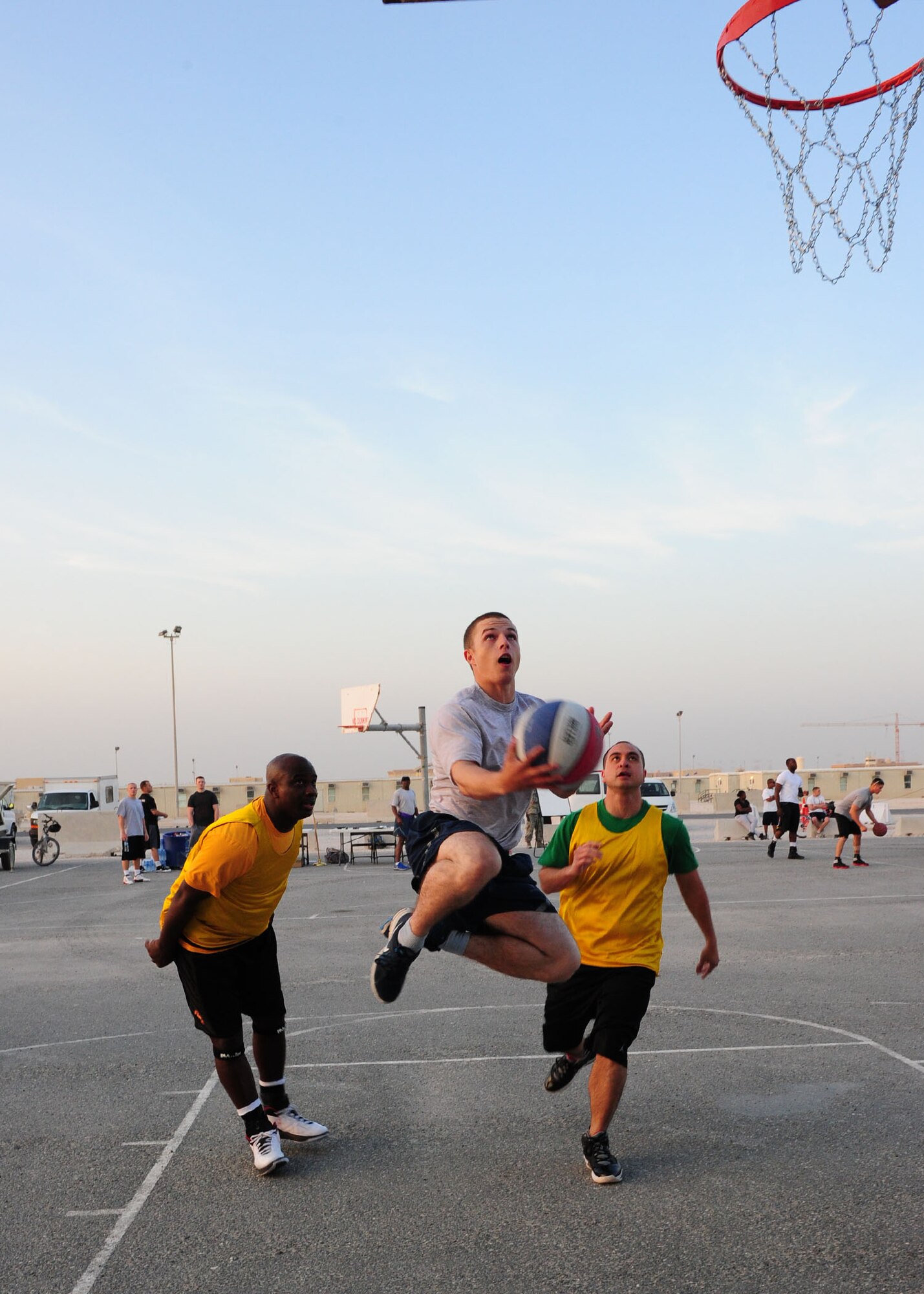 SOUTHWEST ASIA – More than 125 personnel participated in the Rising Six’s 3-on-3 street basketball tournament Jan. 5 designed to encourage camaraderie amongst the deployed service members. The Rising Six is a service-base organization open to all enlisted service members from E-1 to E-6. (U.S. Air Force photo/Master Sgt. Brendan Kavanaugh)