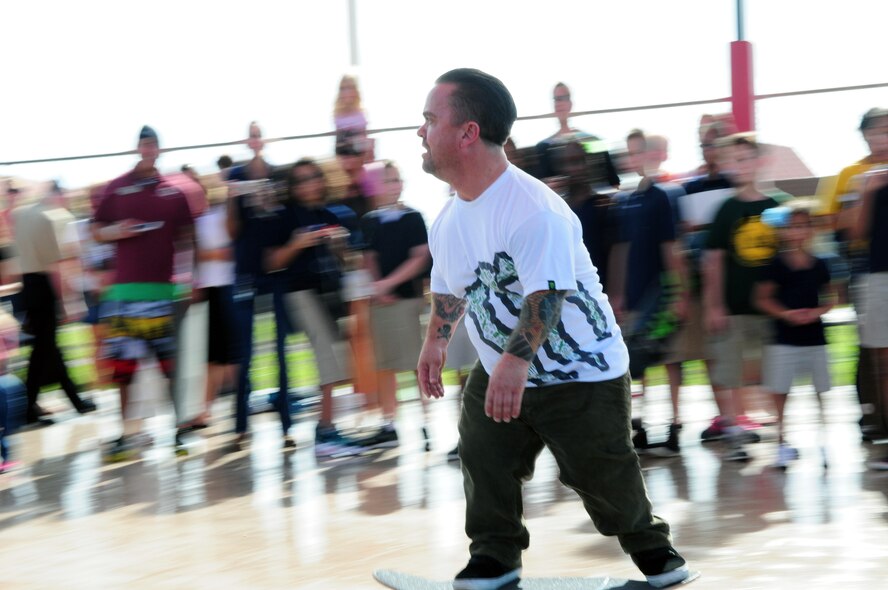 Actor Jason “Wee Man” Acuña skateboards in front of Team Andersen members at the skate park on Andersen Air Force Base, Guam, Jan. 9. Wee Man signed autographs, raffled prizes, conducted a skateboard demonstration and previewed his newest movie for Airmen and family members at Andersen as part of his Wee Man Salutes the Service tour. (U.S. Air Force photo by Senior Airman Robert Hicks/Released)