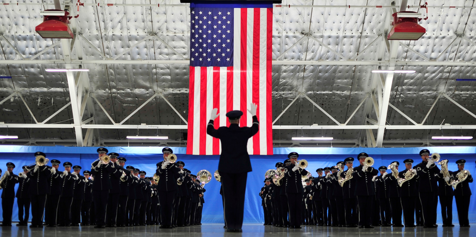 Col. Larry Lang, U.S. Air Force Band commander and conductor, leads the band in a musical selection during rehearsal for the 57th Presidential Inaugural Parade on Joint Base Andrews, Md., Jan. 11, 2013. Approximately 15,000 military personnel from 133 units will be participating in the parade January 21, 2013. (U.S. Air Force photo/ Airman 1st Class Erin O’Shea)