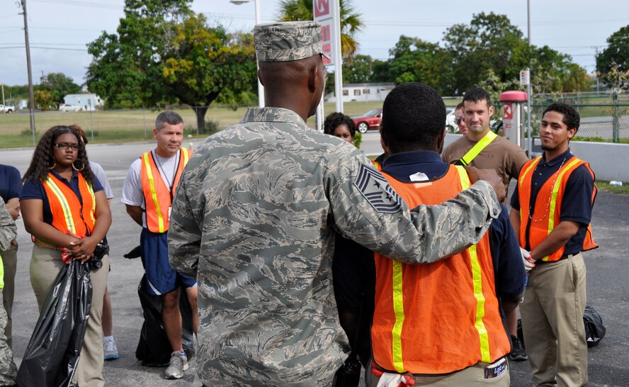 Airmen and servicemembers from Homestead Air Reserve Base, Fla., along with students of Homestead Job Corps, cleaned up roadside trash along 10 blocks of South West 288th St. in support of Adopt-A-Highway in Homestead, Fla., recently. The base has partnered with Job Corps on multiple occasions to provide outreach to the area. (U.S. Air Force photo/Senior Airman Jacob Jimenez)