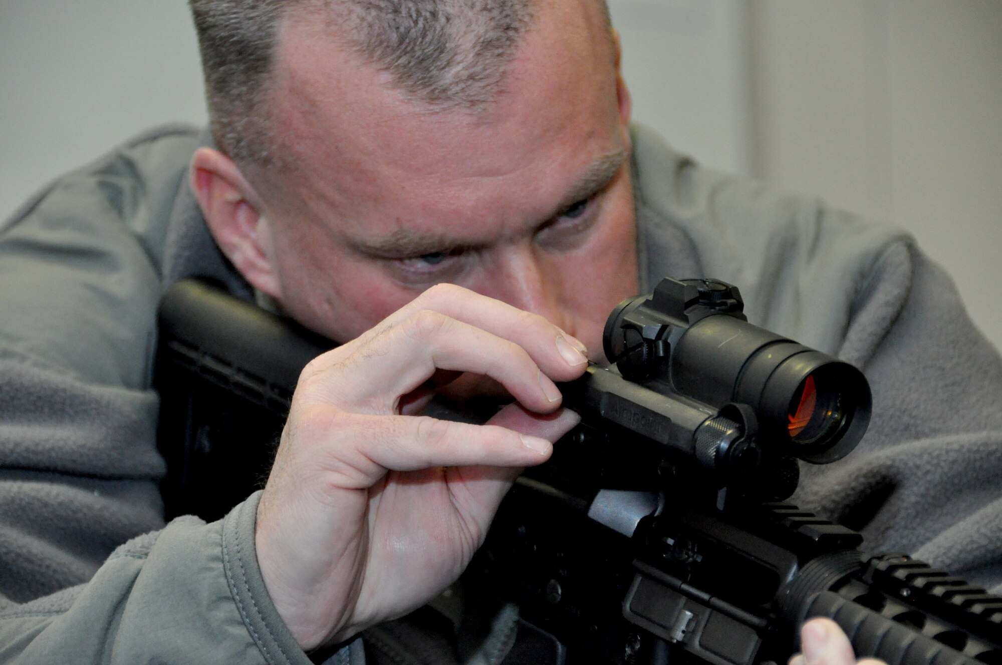 Staff Sgt. Michael Booker, 442nd Civil Engineers Squadron, prepares his weapon during classroom training Jan. 12, 2013. Approximately 25 reservists from the 442nd CES are scheduled to deploy in March in support of Operation Enduring Freedom. The 442nd Civil Engineers Squadron is part of the 442nd Fighter Wing, an A-10 Thunderbolt II Air Force Reserve unit at Whiteman Air Force Base, Mo. (U.S. Air Force photo by Tech. Sgt. Danielle Johnston)
