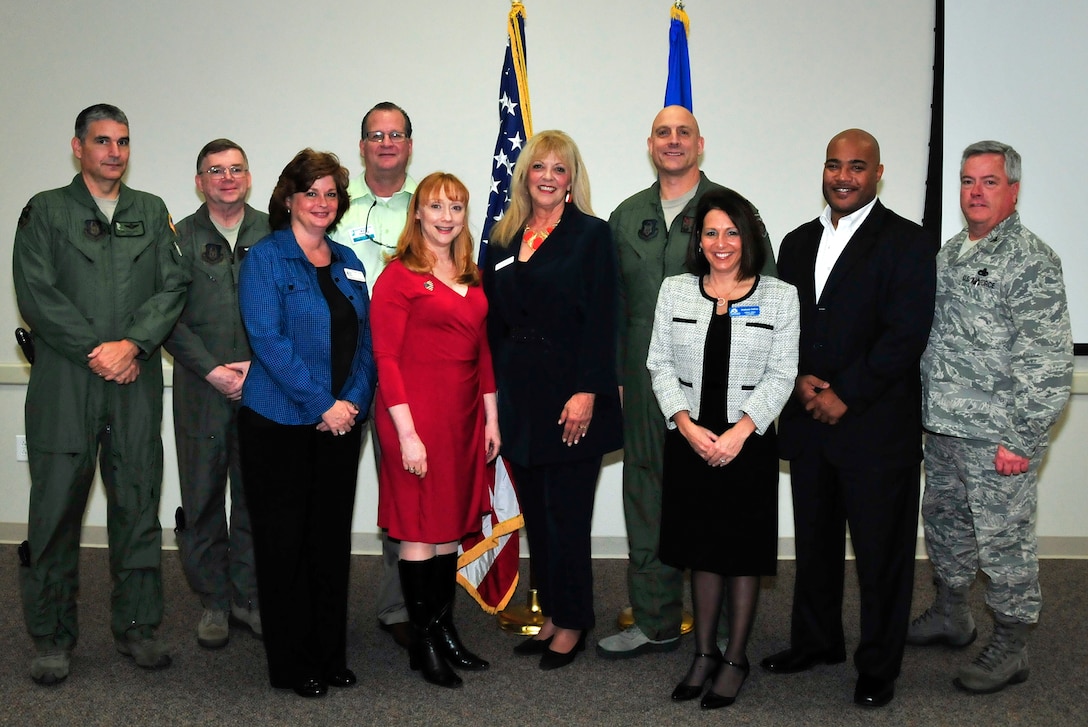 The 919th Special Operations Wing inducted six new community leaders in the honorary commander program Jan. 12 at Duke Field, Fla.  (From left to right) Col. James Phillips, Col. (Dr.) Edward Seeliger, Michele Tucker, Mark Hamrick, Marcia Wright-Reynolds, Marian McBryde, Col. Anthony Comtois, Stephanie DuPree, Christopher Daggs, Col. Ken Honaker. Under the program, civic leaders learn about the mission of the 919th SOW and its Air Force Reserve role in national defense. (U.S. Air Force photo/Tech. Sgt. Samuel King Jr.)